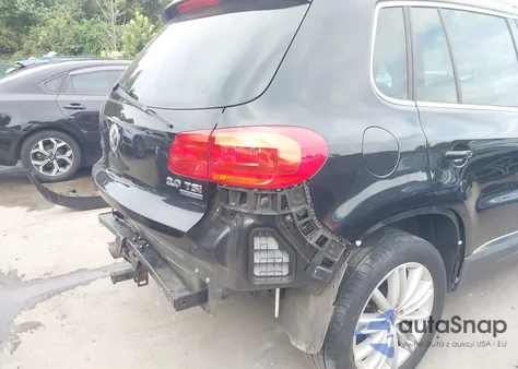 2014 Volkswagen Tiguan Sel z USA, uszkodzony, nr VIN WVGBV3AX0EW601416